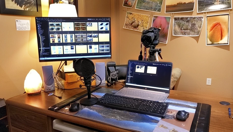 Computer, camera and microphone set-up ready for an online photography course