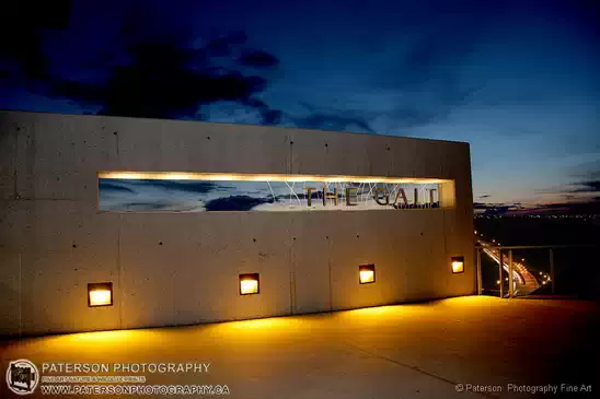 City Of Lethbridge Galt Museum sign at night with Whoop-up drive in the background