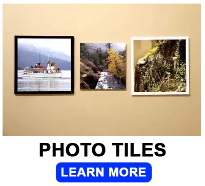 Photo tiles shown displayed on a wall